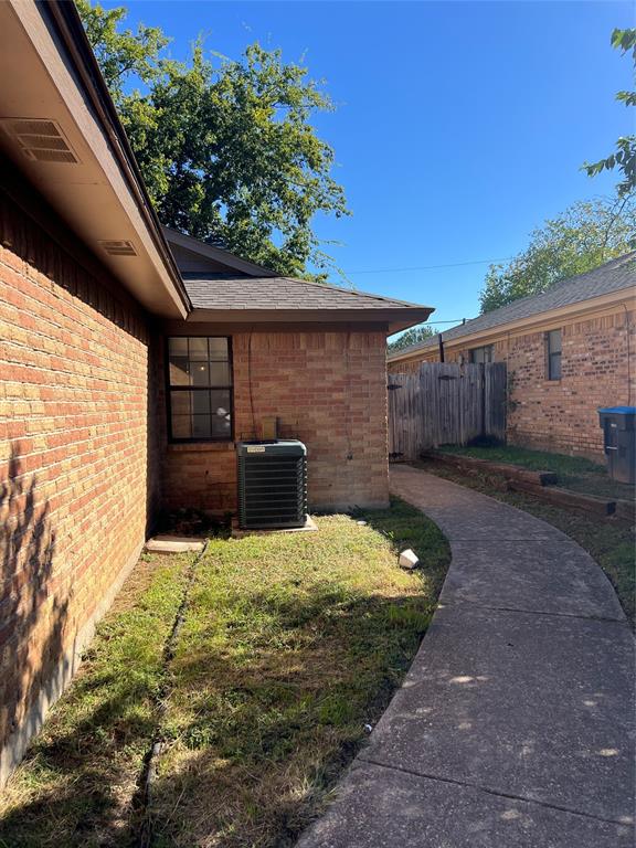 a view of a backyard of the house