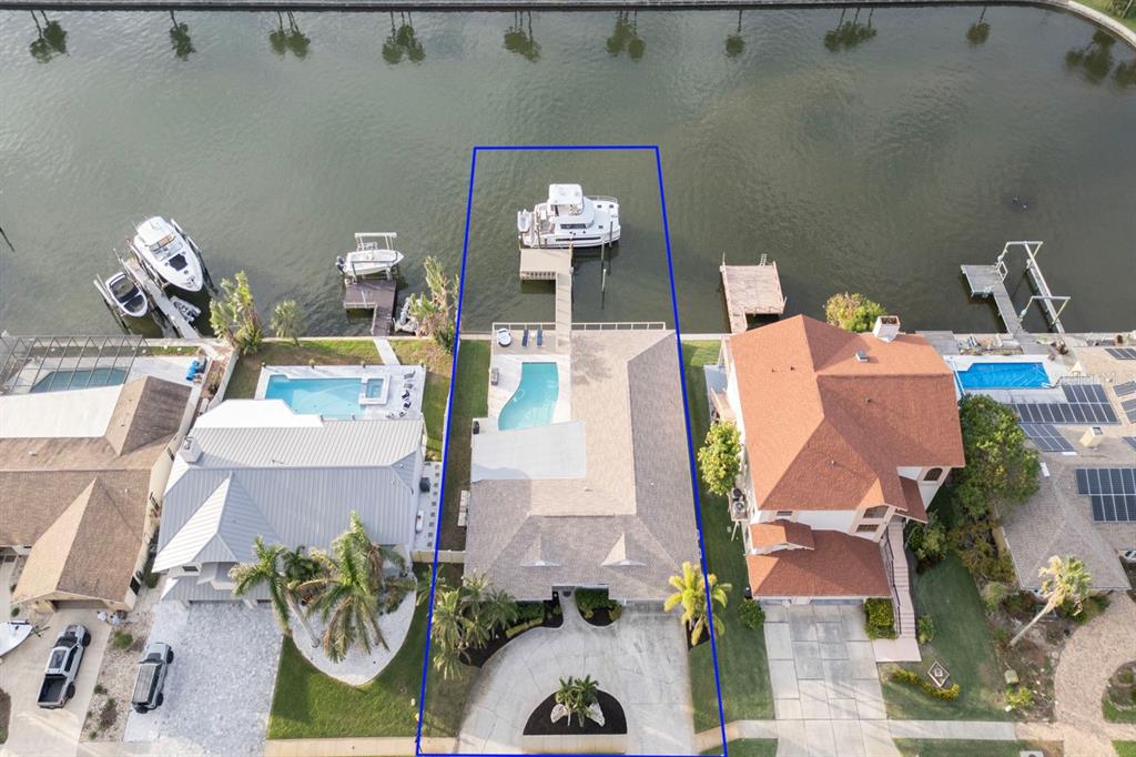 an aerial view of a house with patio