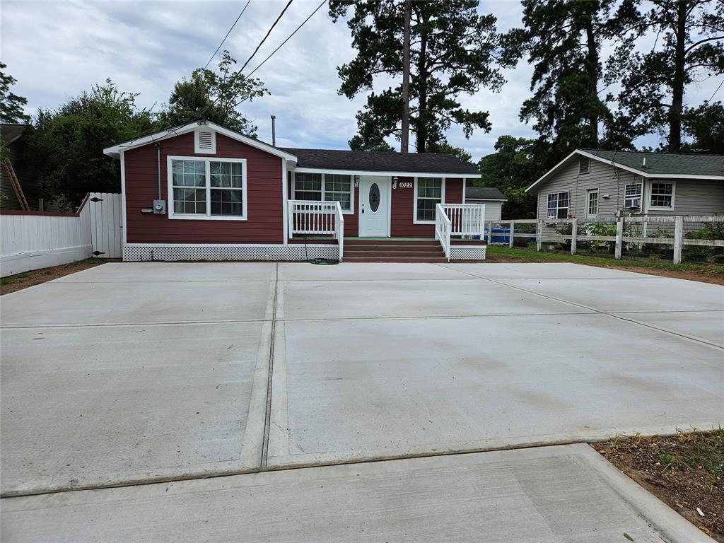 front view of a house with a street