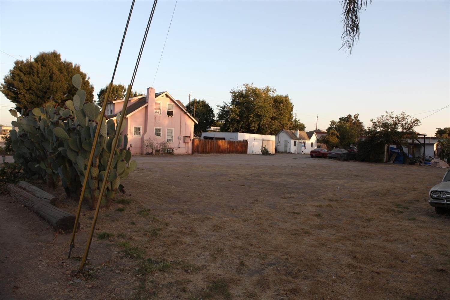 a view of a road with a building in the background