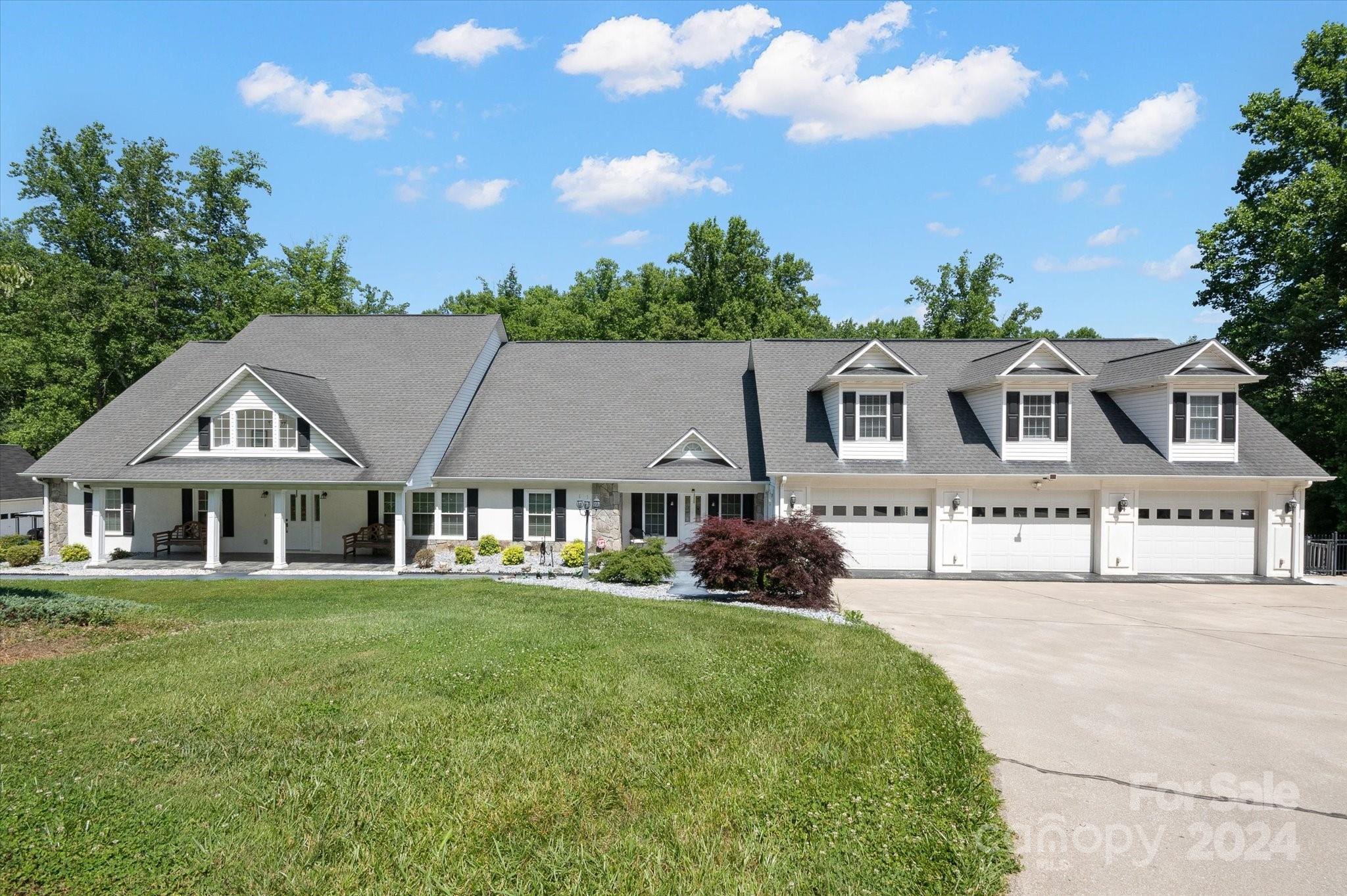 front view of a house with a garden