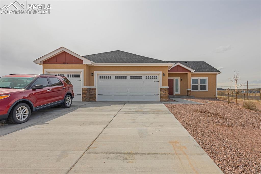 View of front facade with a garage