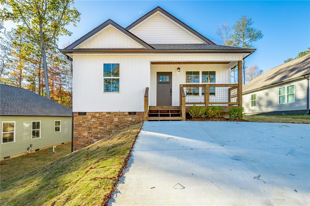 a front view of a house with yard