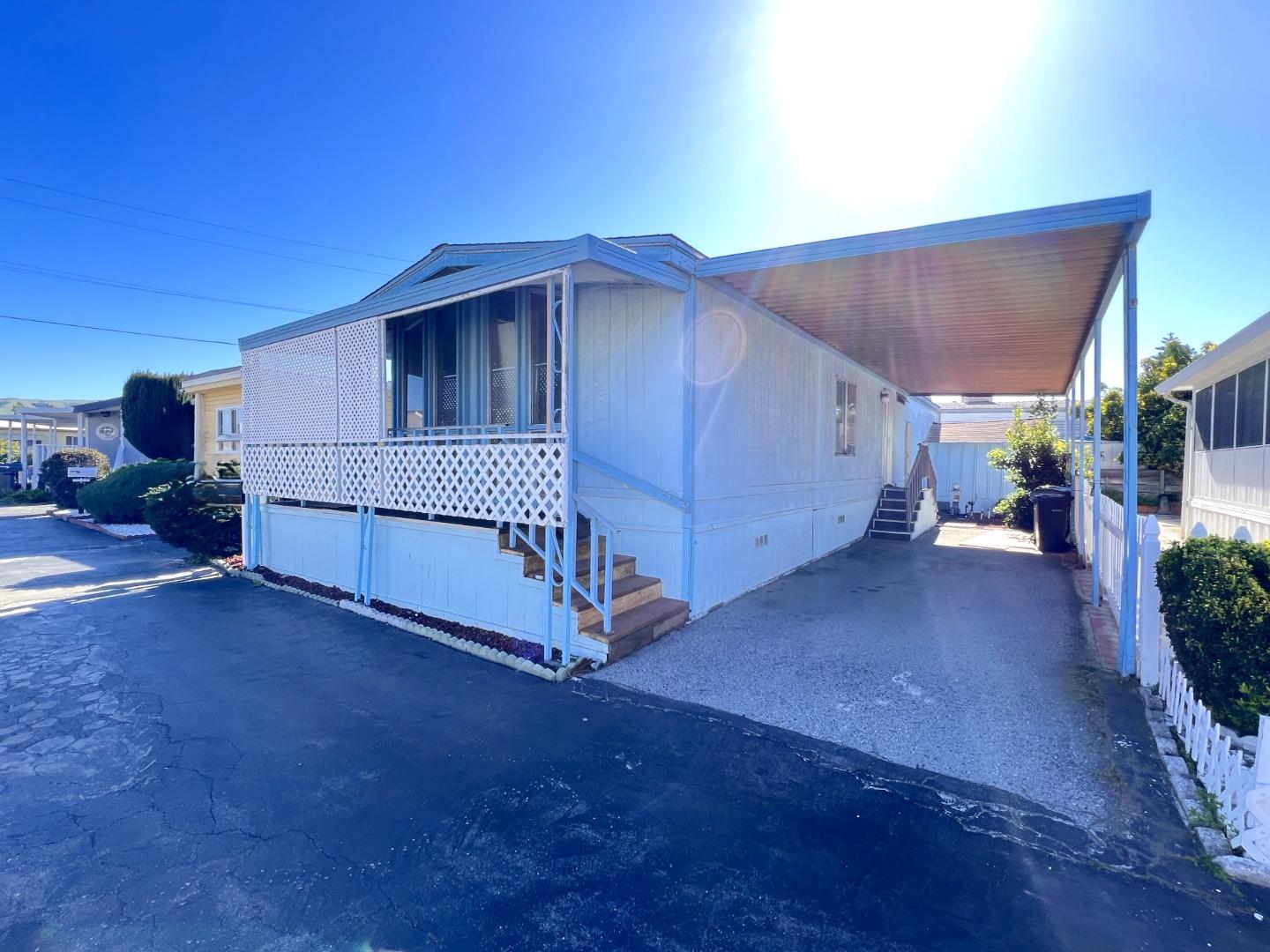 a view of backyard with cabin