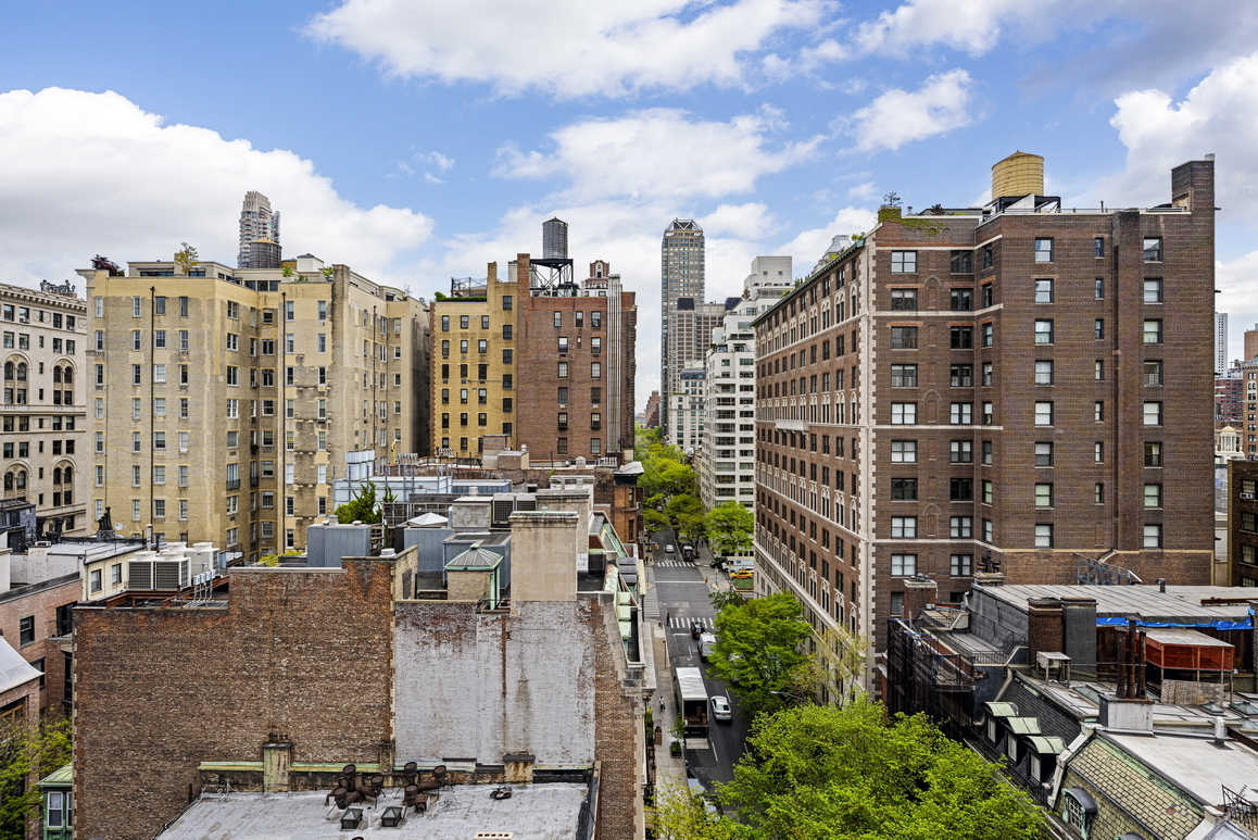 a view of a city with tall buildings