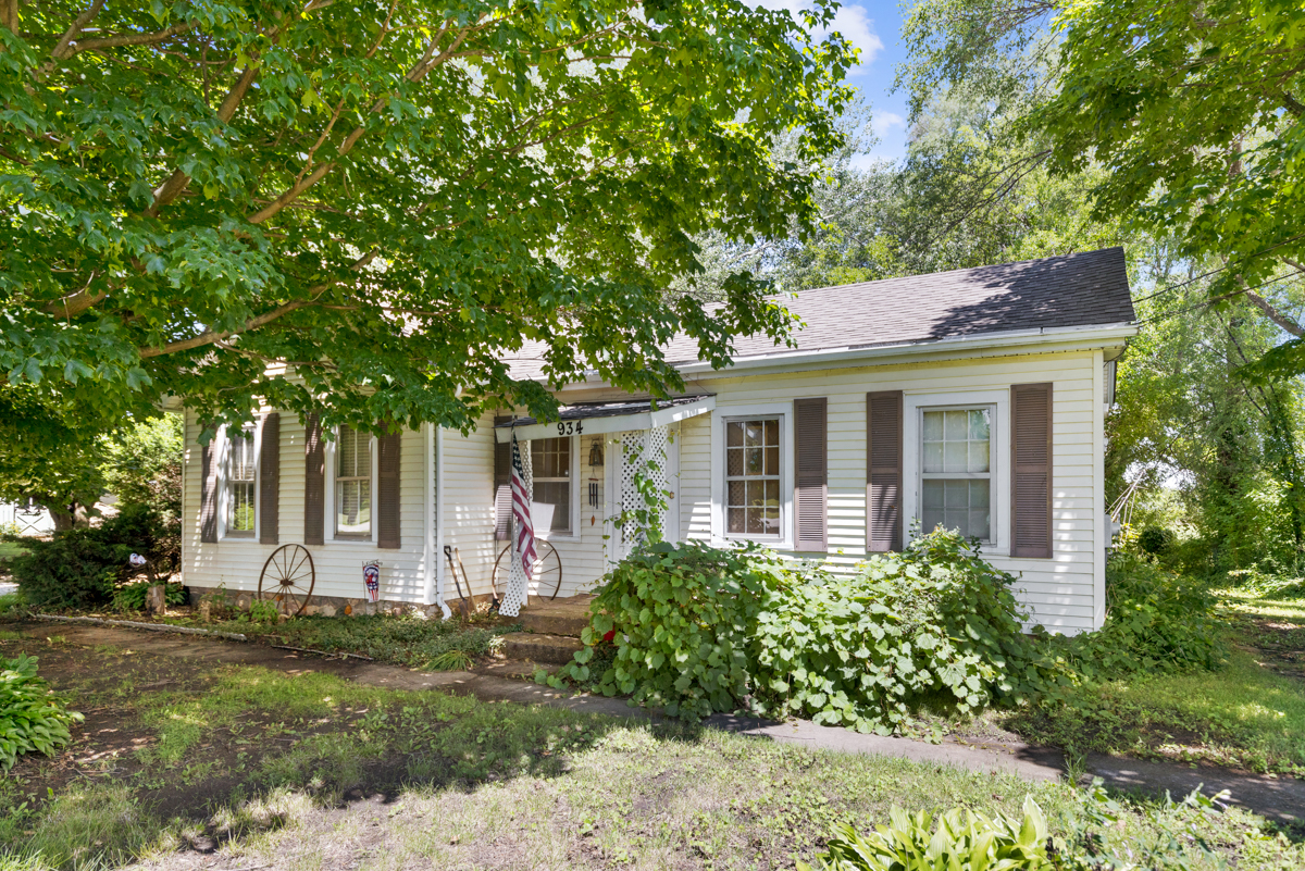 front view of a house with a garden