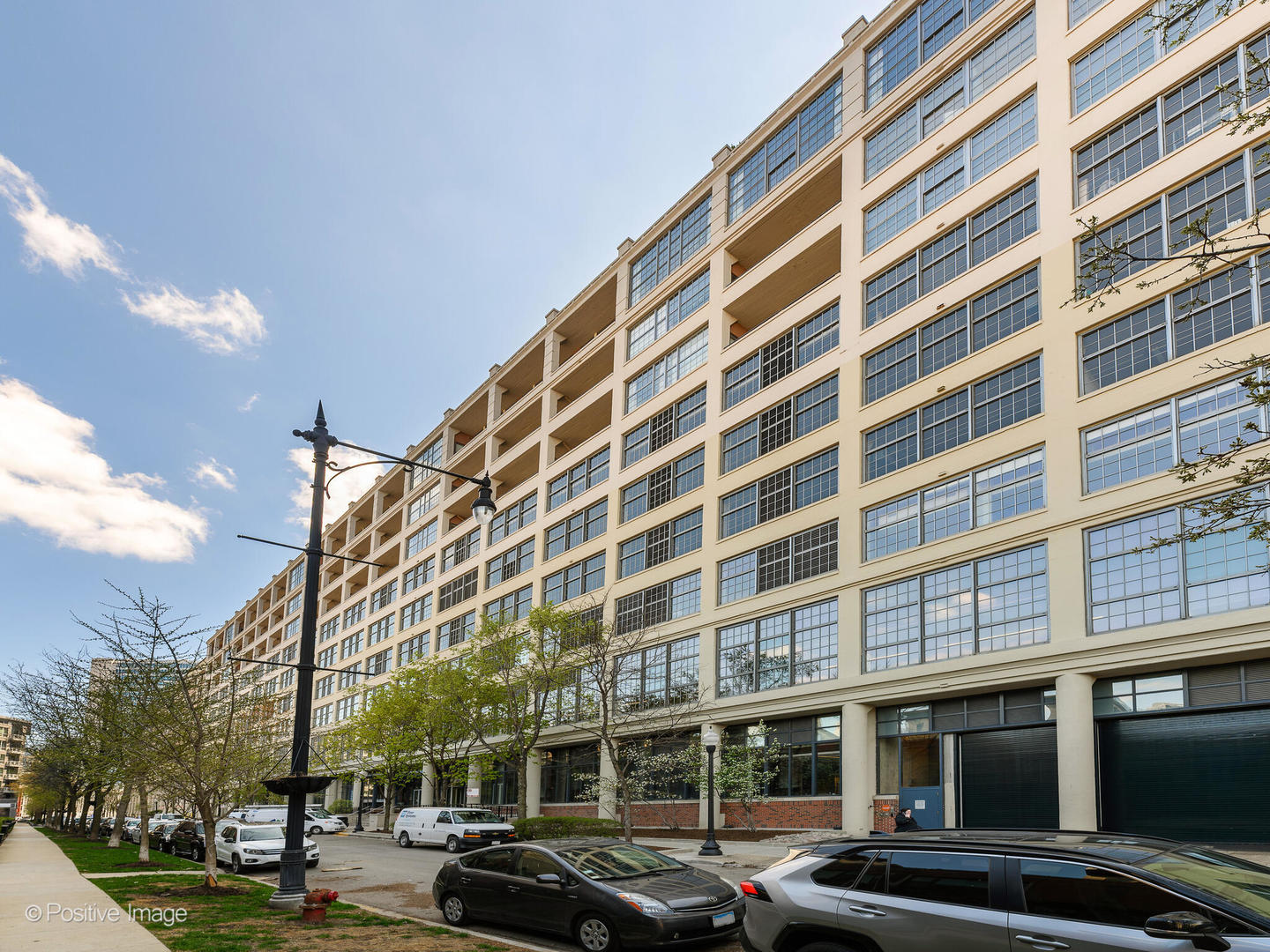 a front view of a building with street view