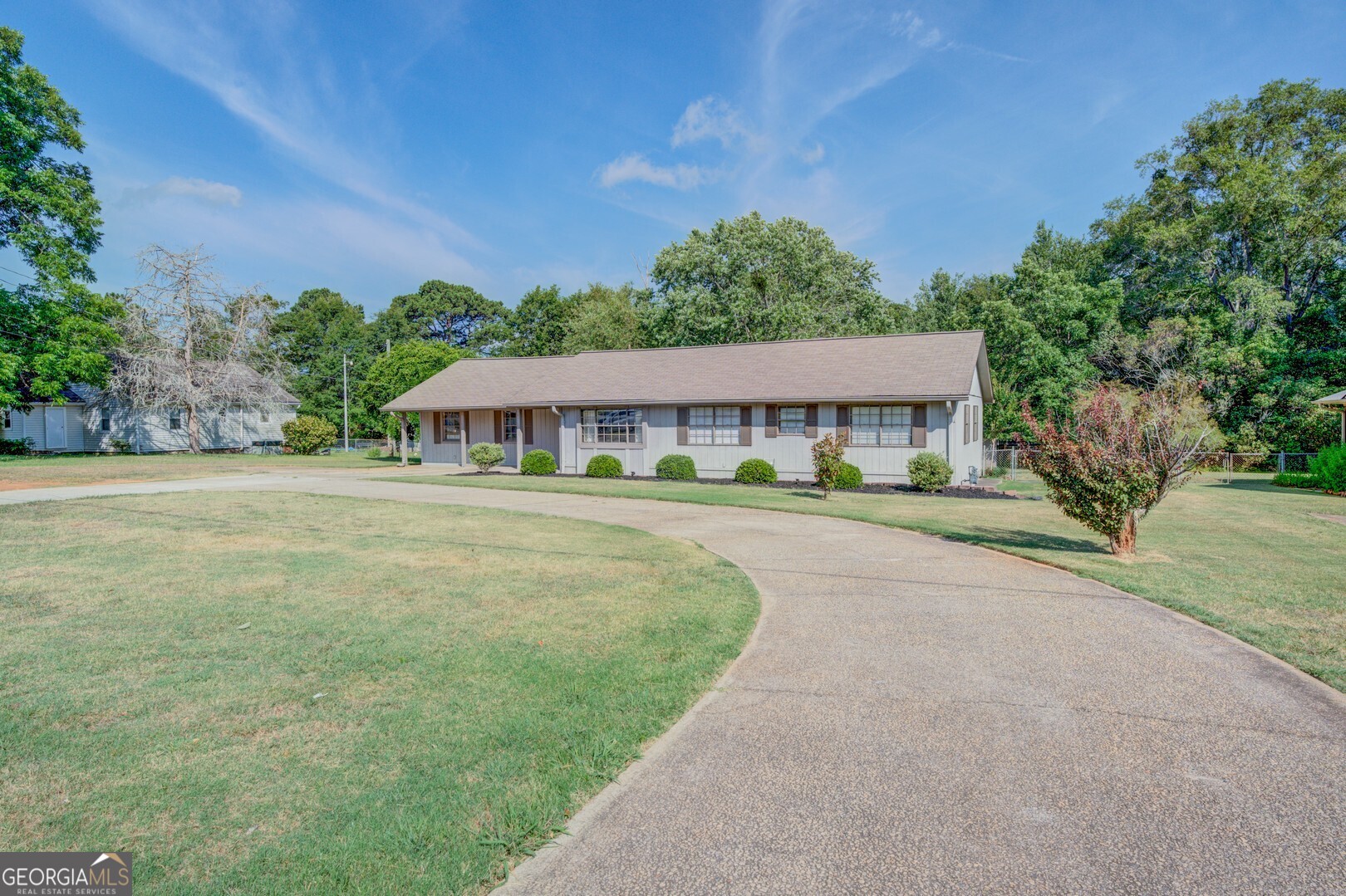 front view of house with a yard