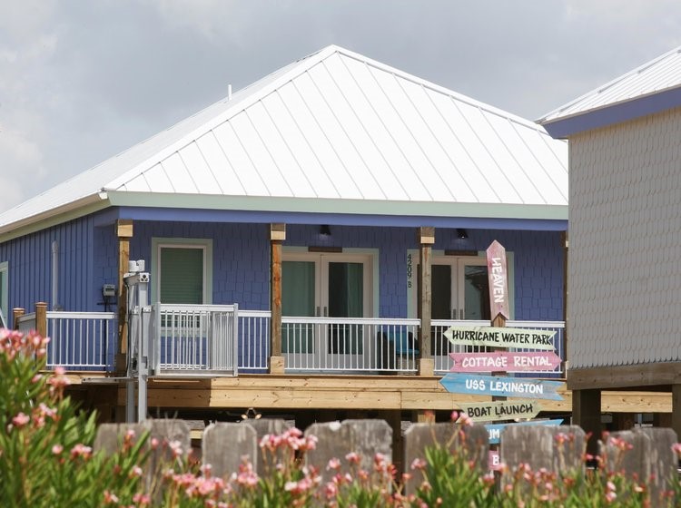 a front view of a house with a porch