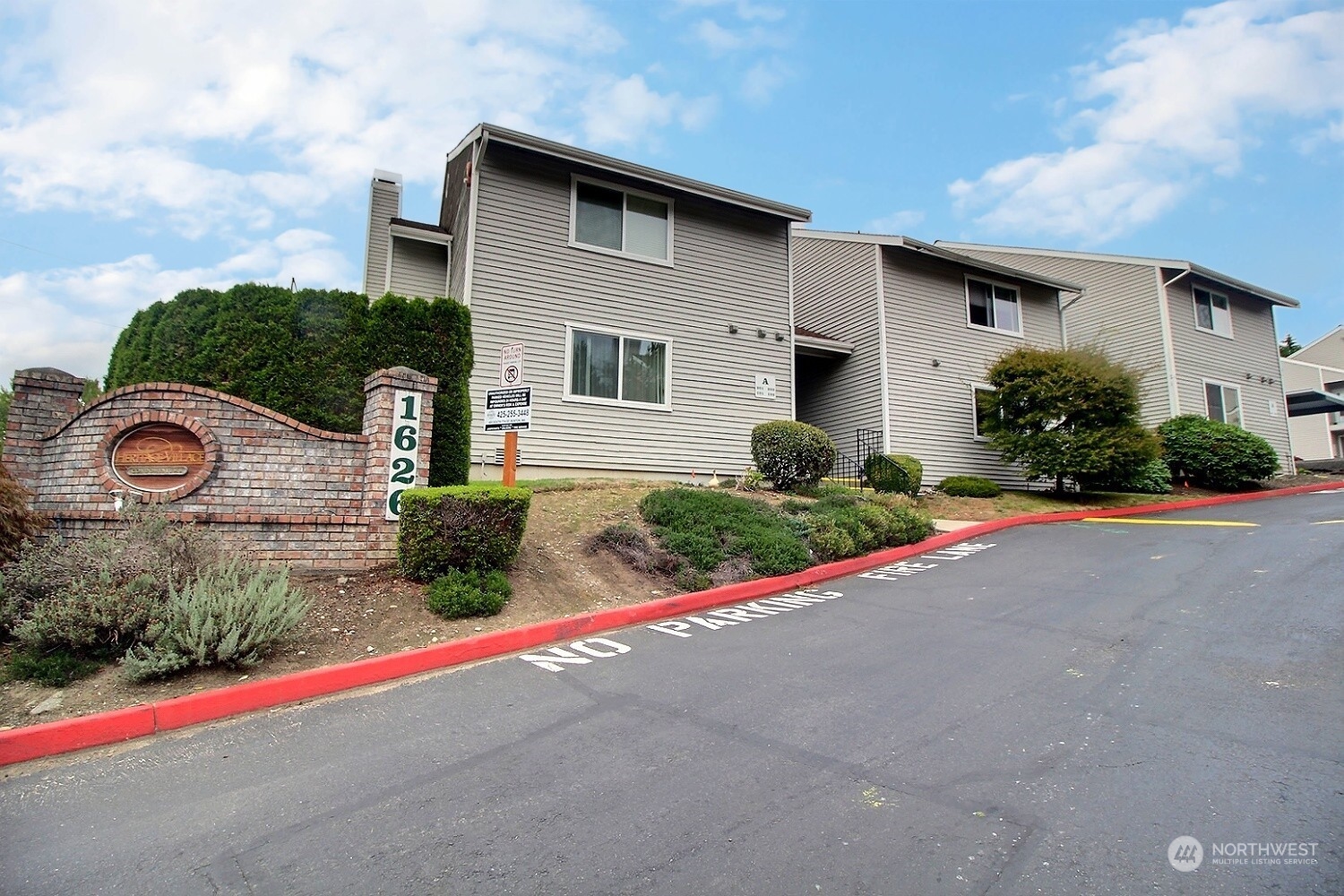 a front view of a house with garage