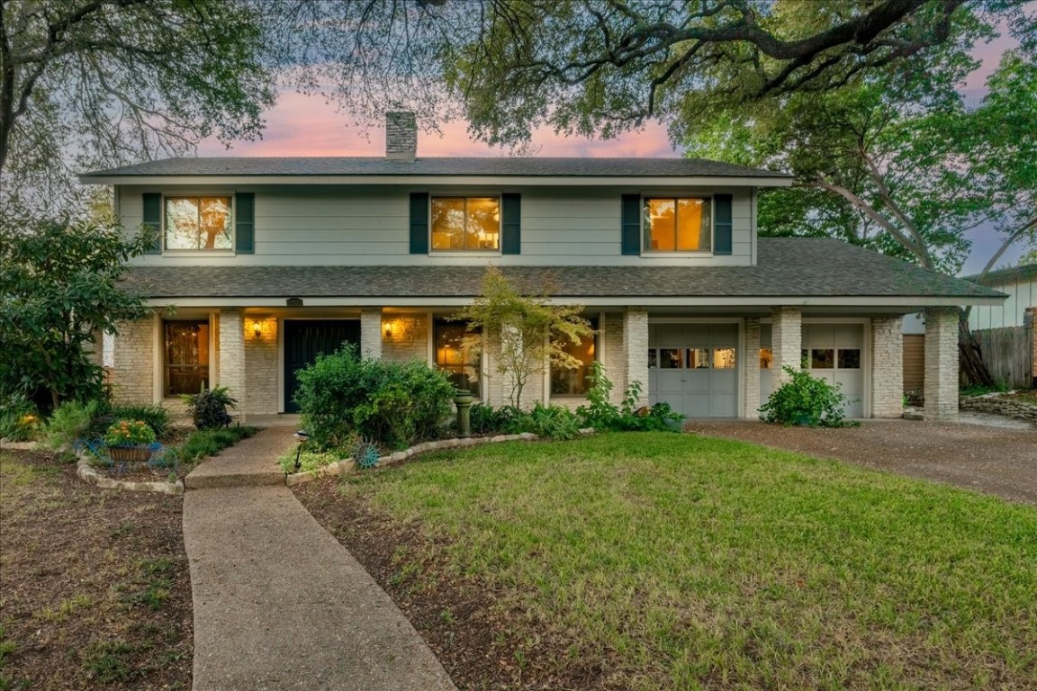 front view of a house with a yard