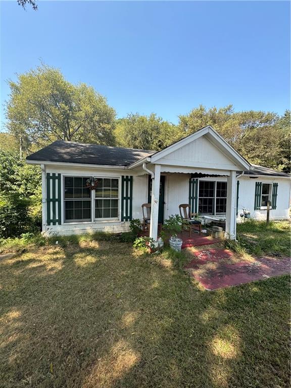 front view of a house with a yard