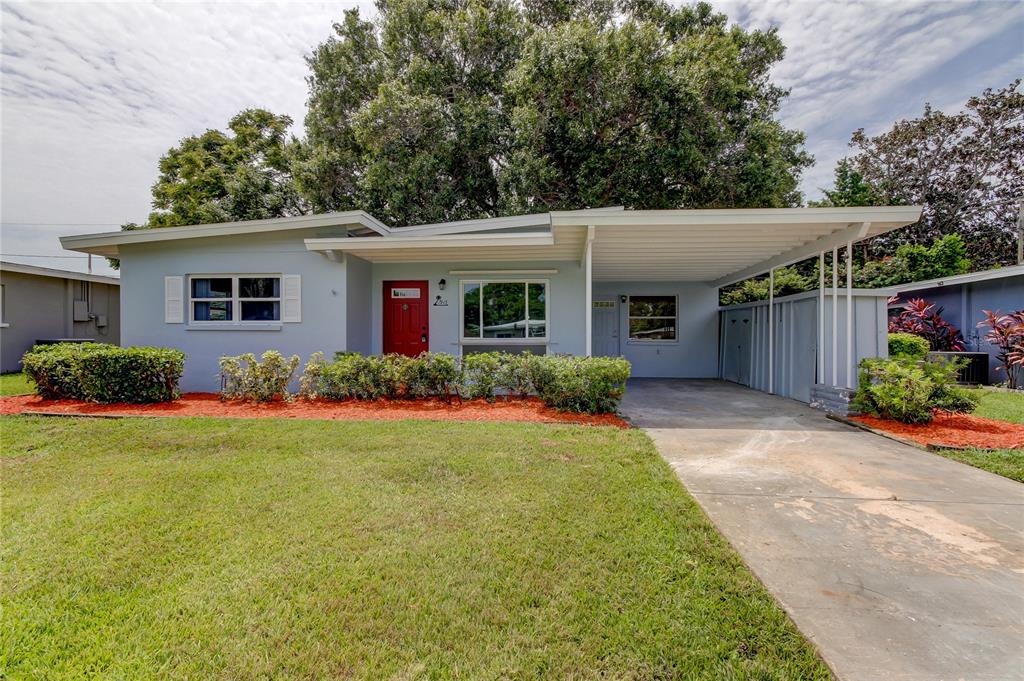 front view of a house with a yard