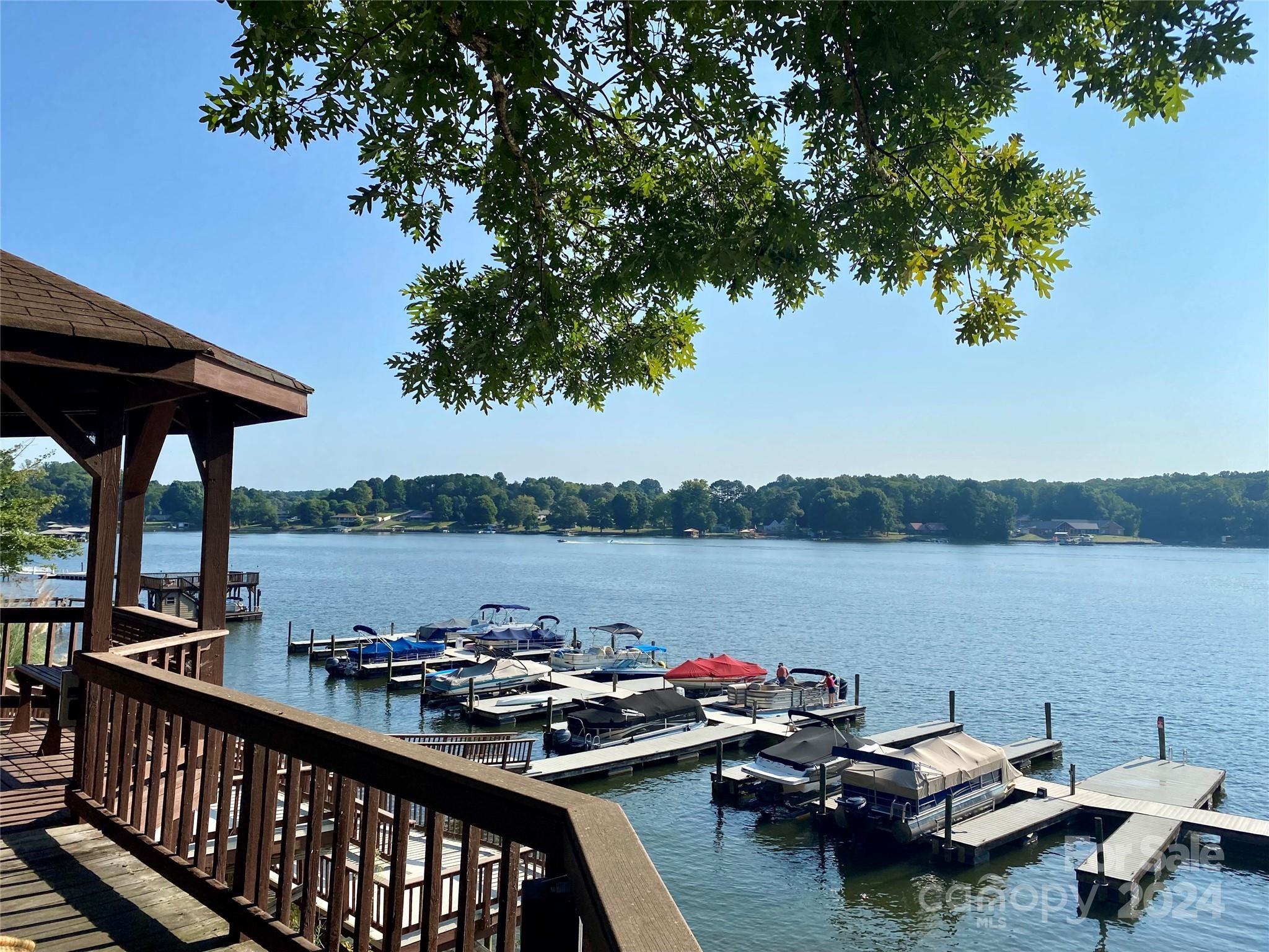 a view of a lake with furniture