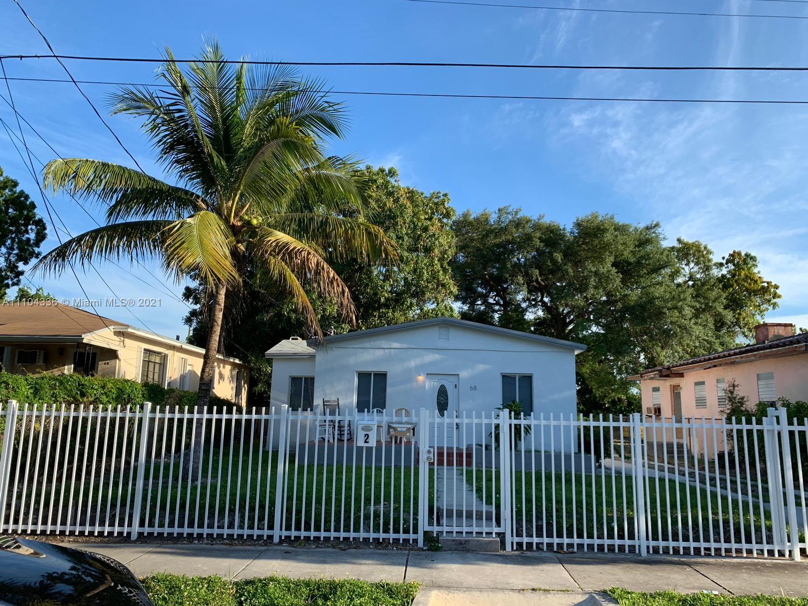 a view of a house with a street view