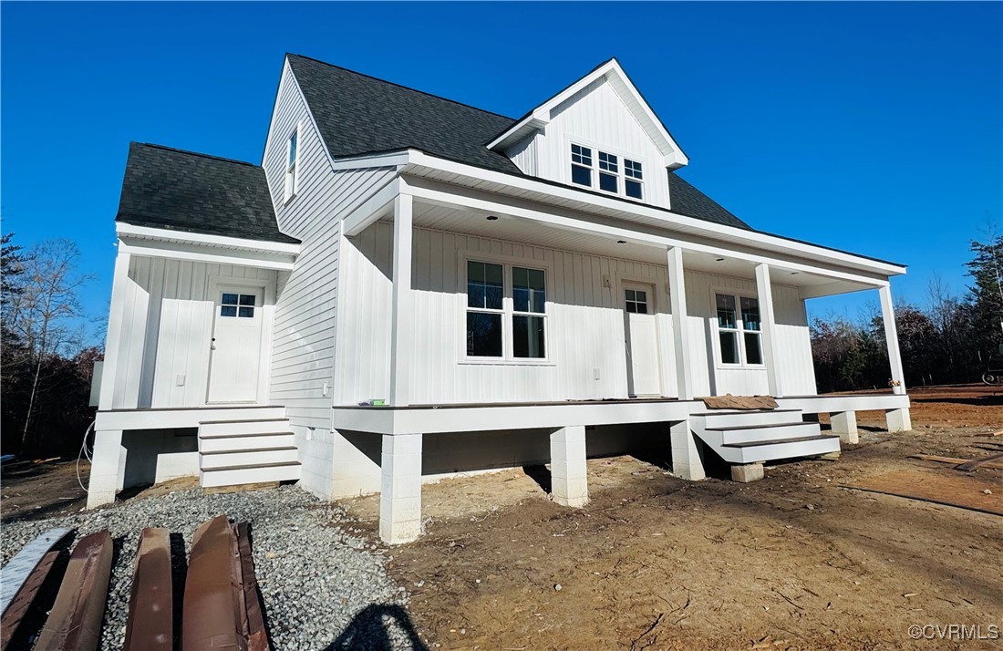 View of front of home featuring covered porch