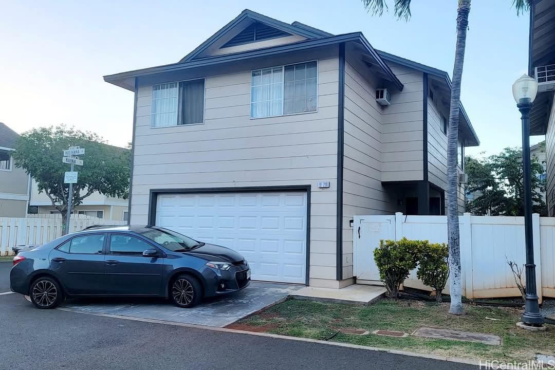 a car parked in front of a house