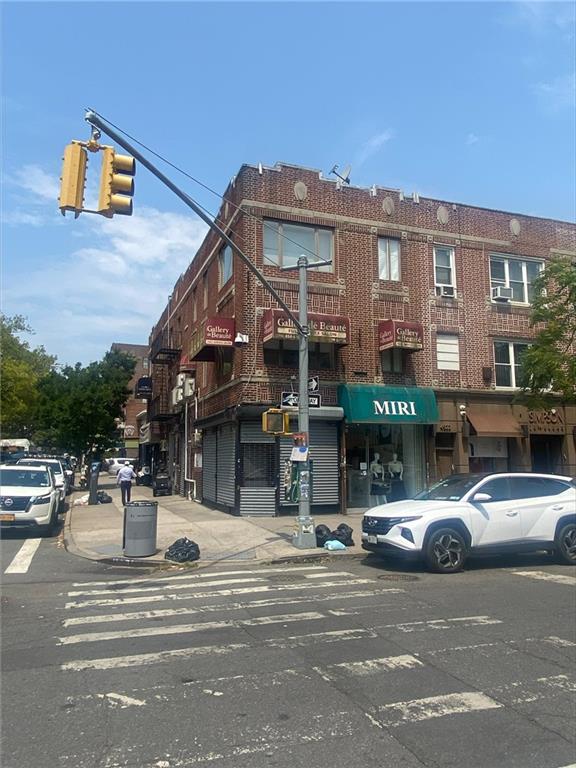 a view of a building with a street