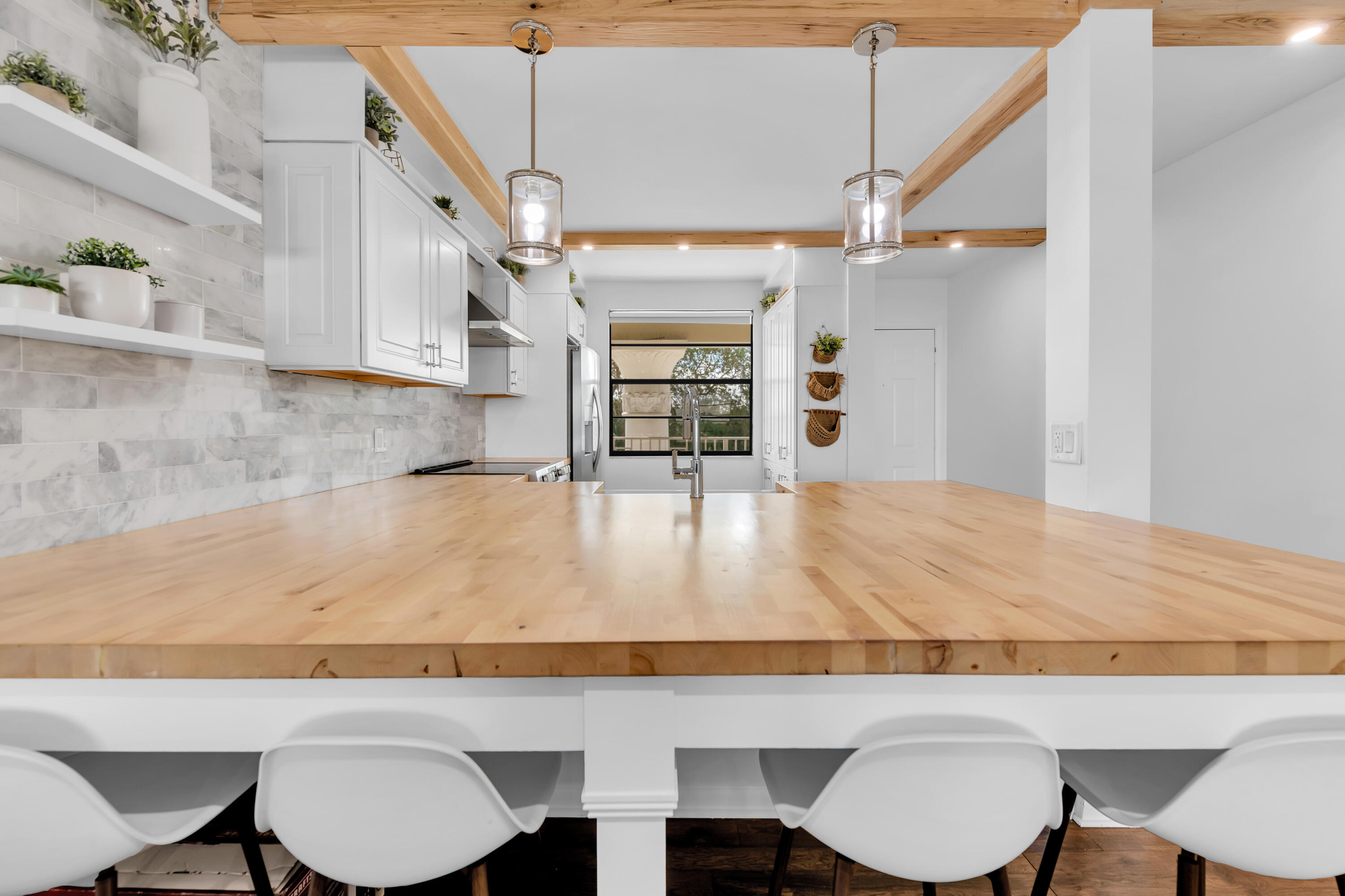 a view of a dining room with furniture