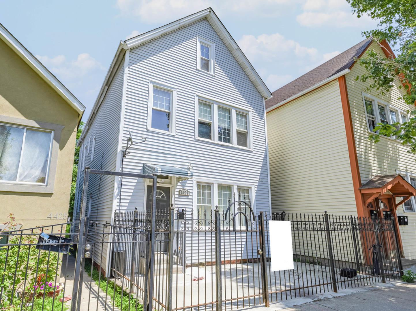 a front view of a house with a porch