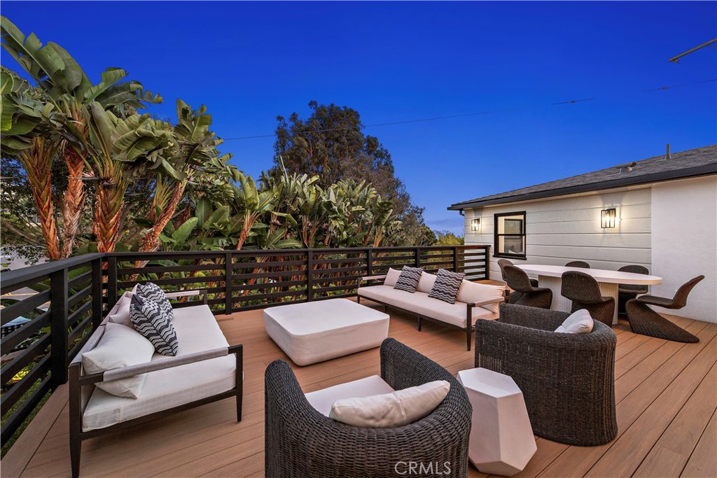 a outdoor living space with furniture and city view