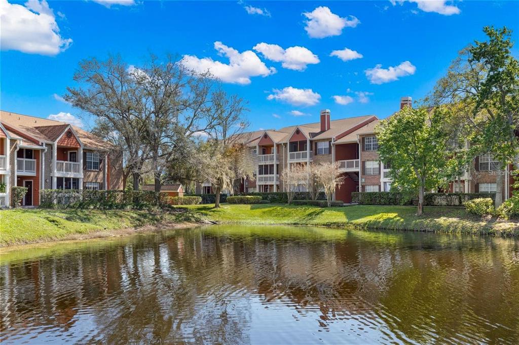 a view of a lake with a building in front of it