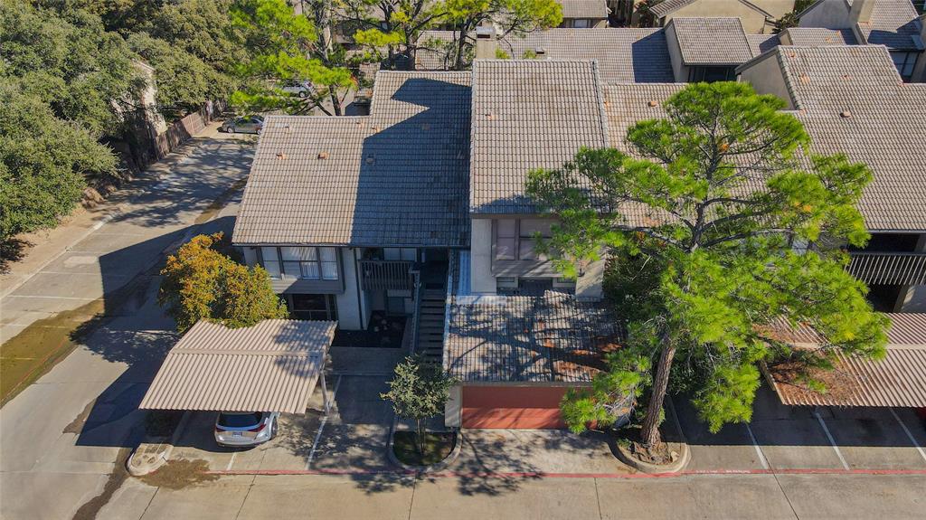 an aerial view of a house with garden