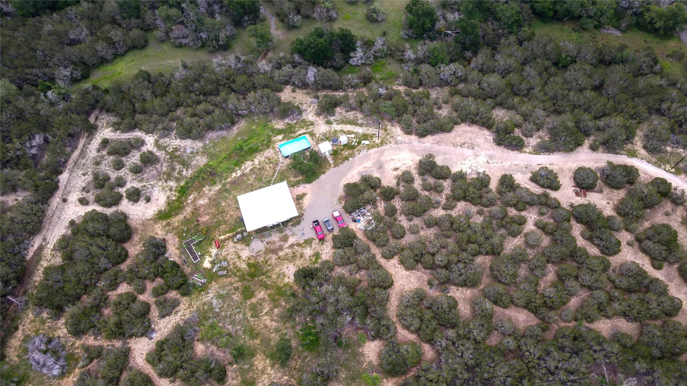 a view of a backyard of the house