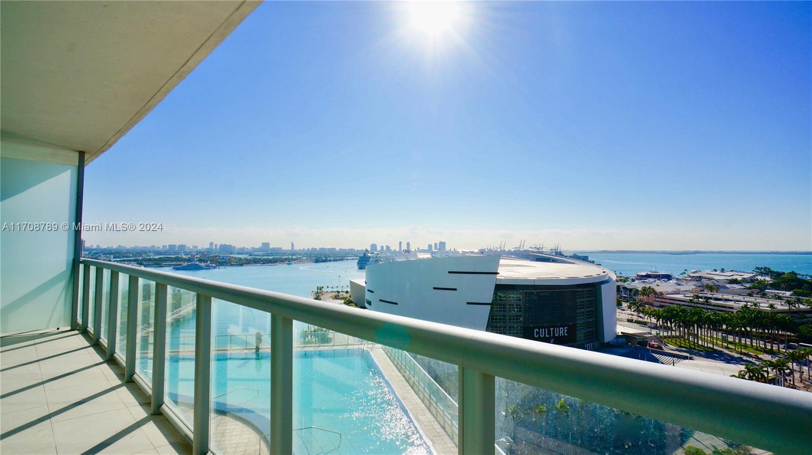 a view of a city skyline from a balcony