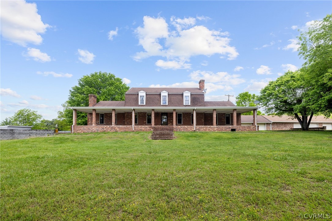 a view of a house with a big yard