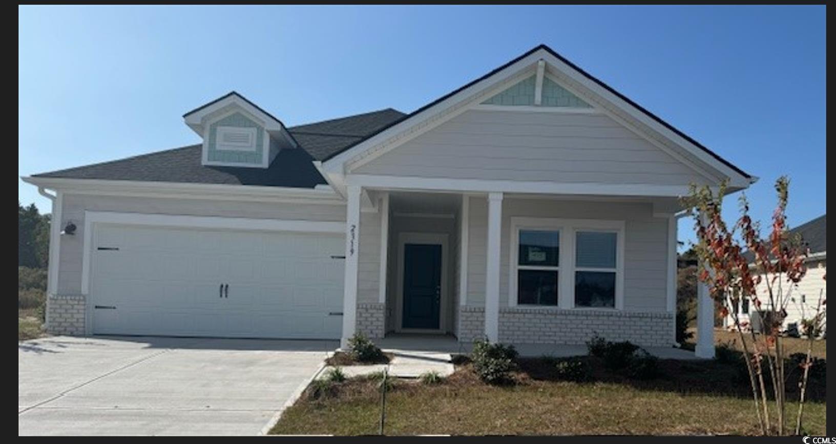 View of front of home featuring a garage