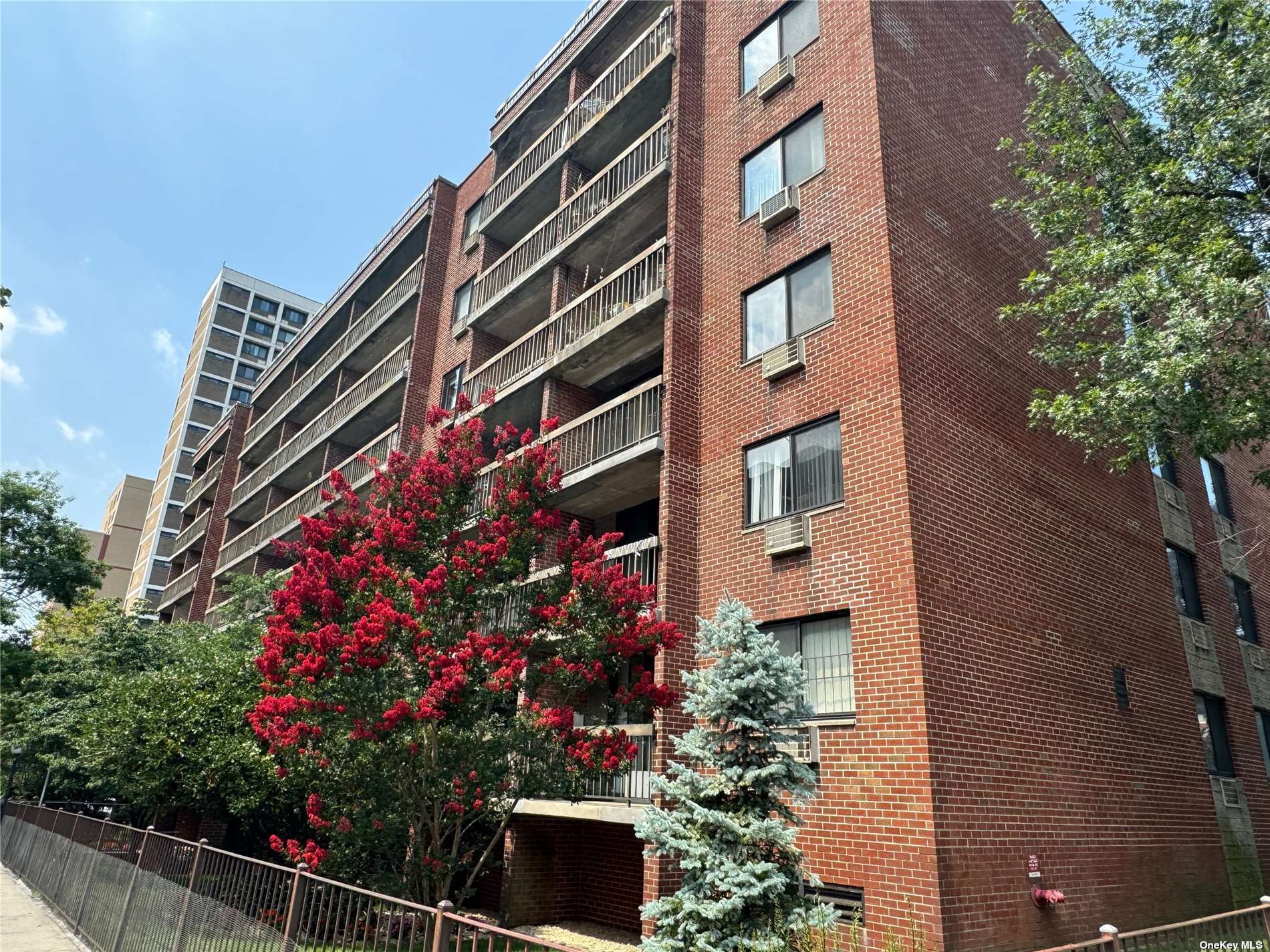 an aerial view of multi story residential apartment building