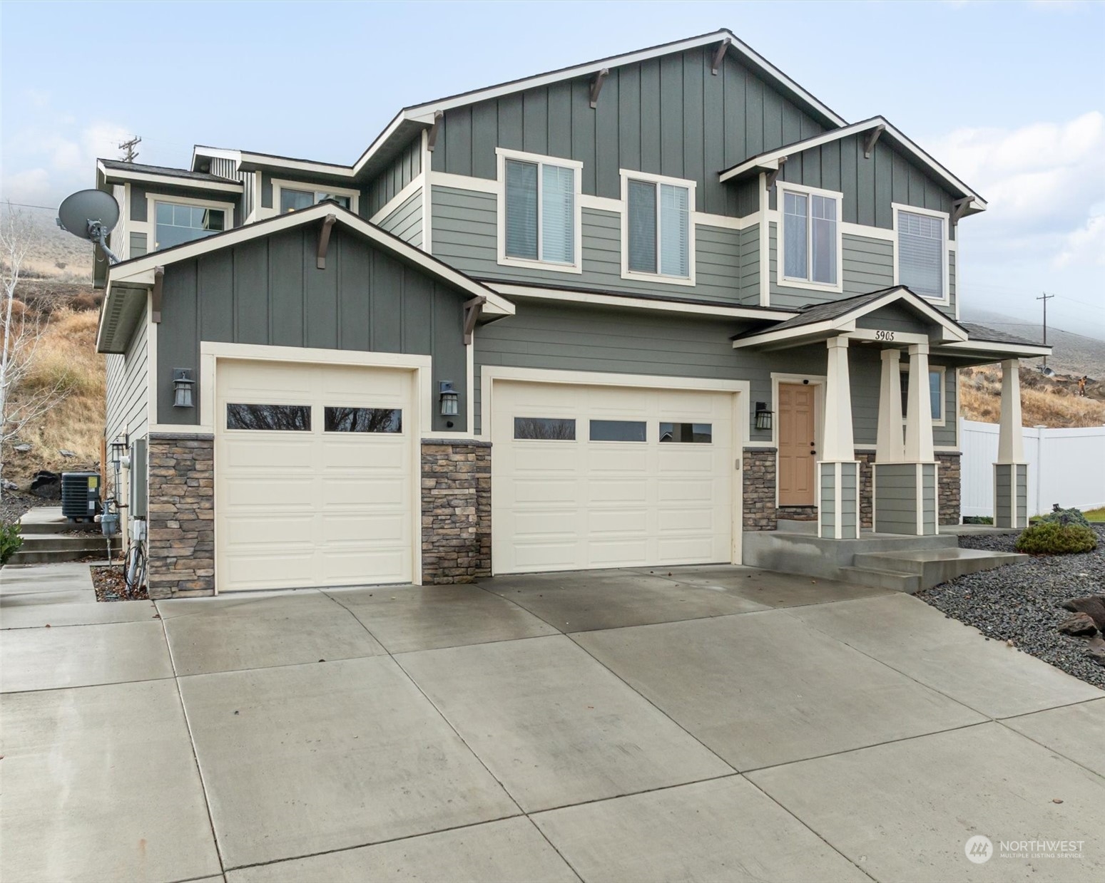 a view of a house with a garage