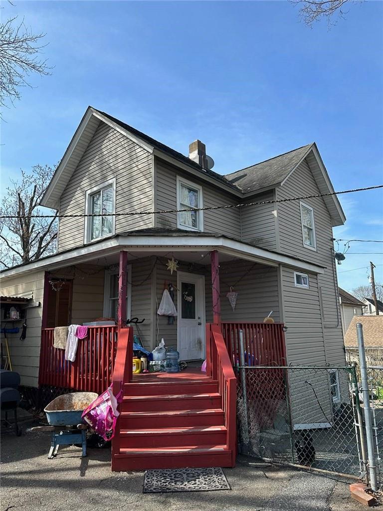 View of front of property with a porch