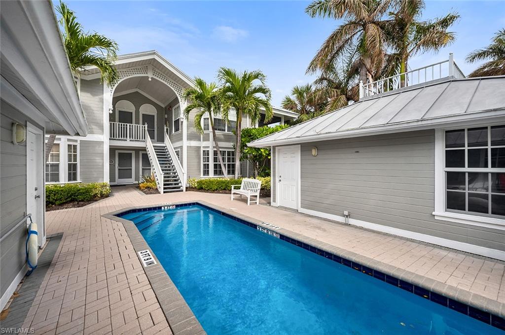 View of pool with a patio and entry