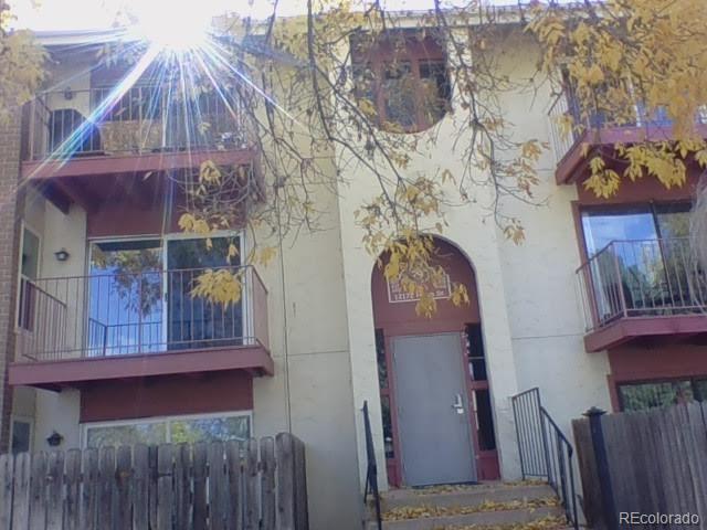 a view of balcony and wooden floor