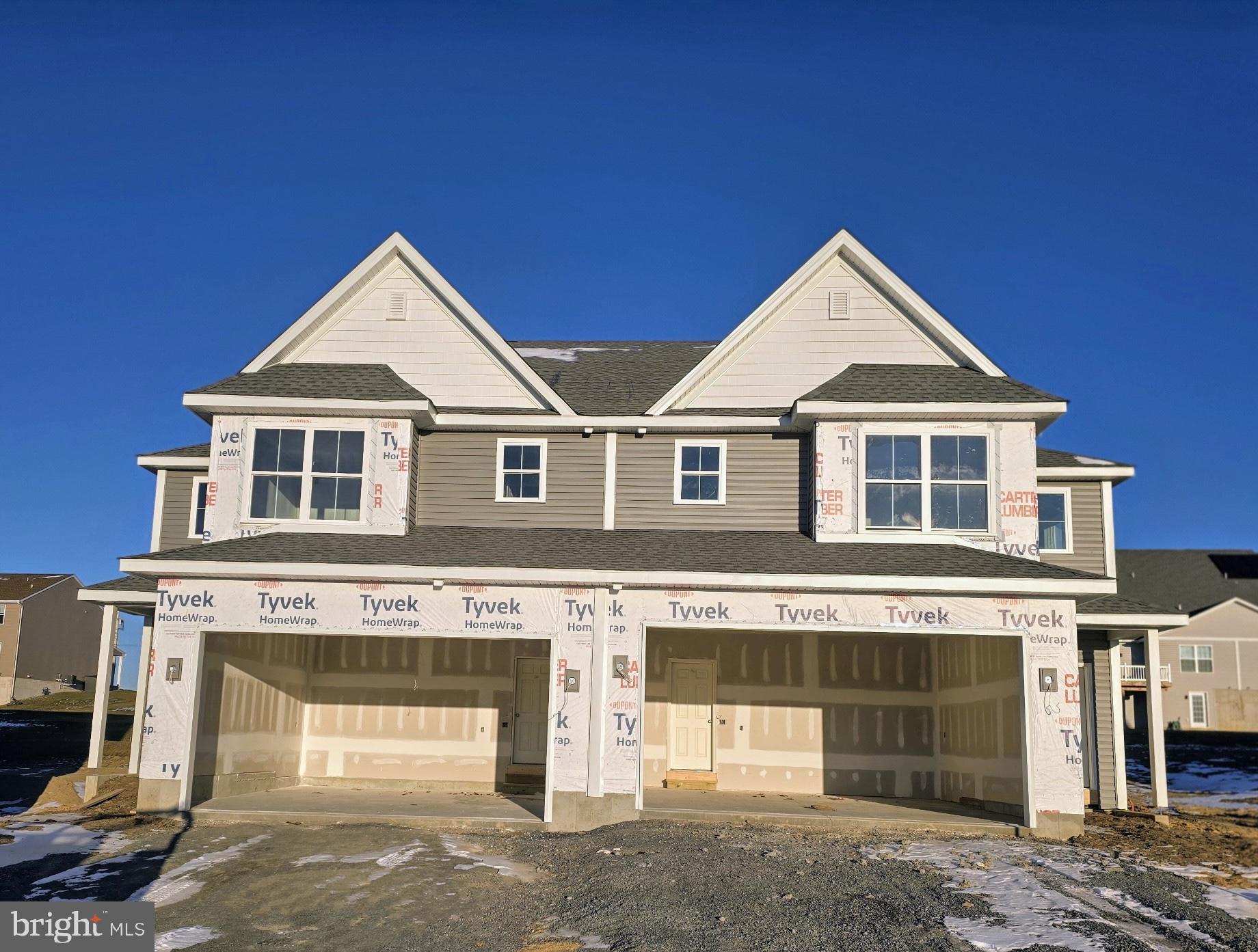 a view of a house with a garage