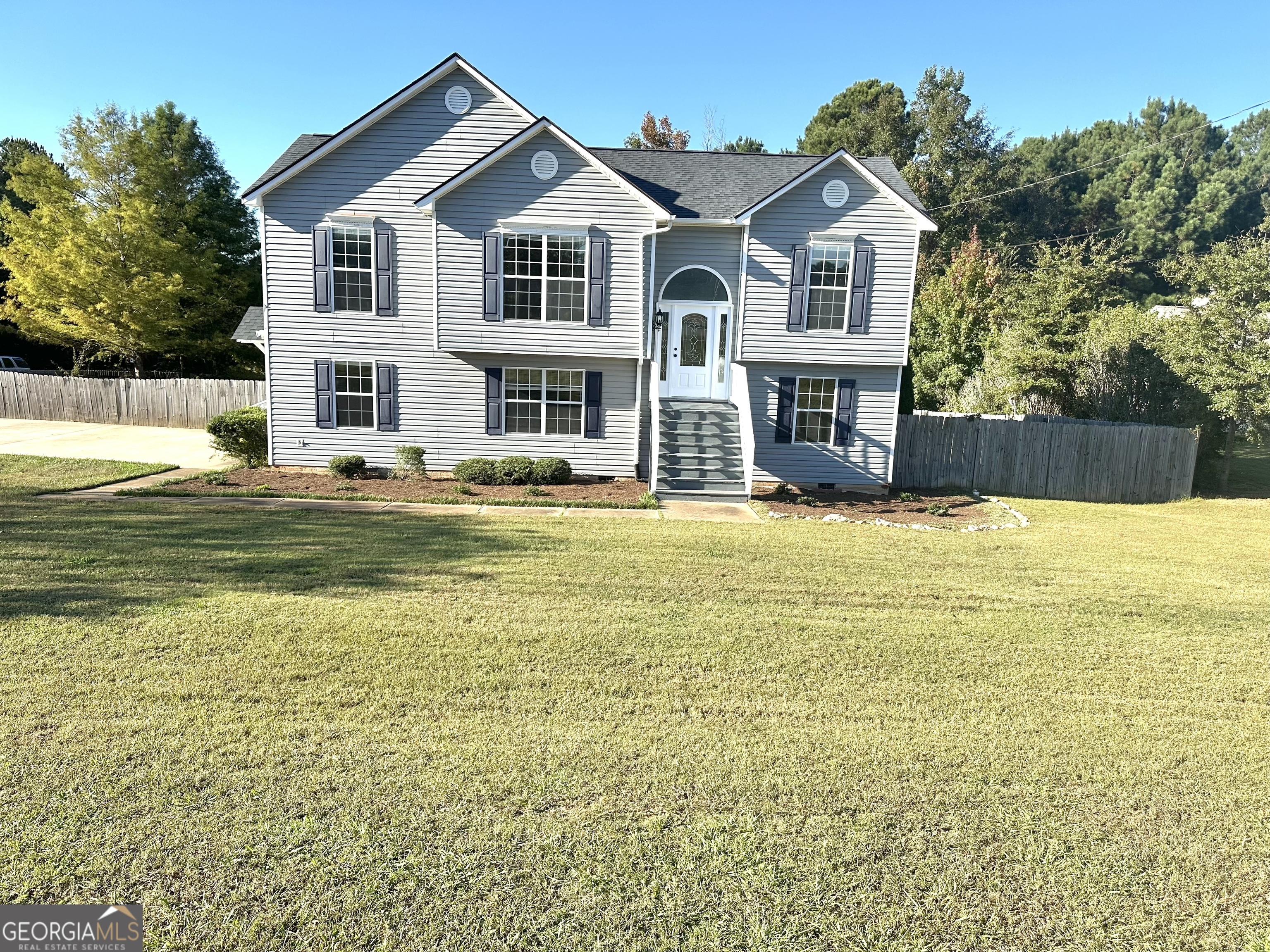 a view of a house with a swimming pool