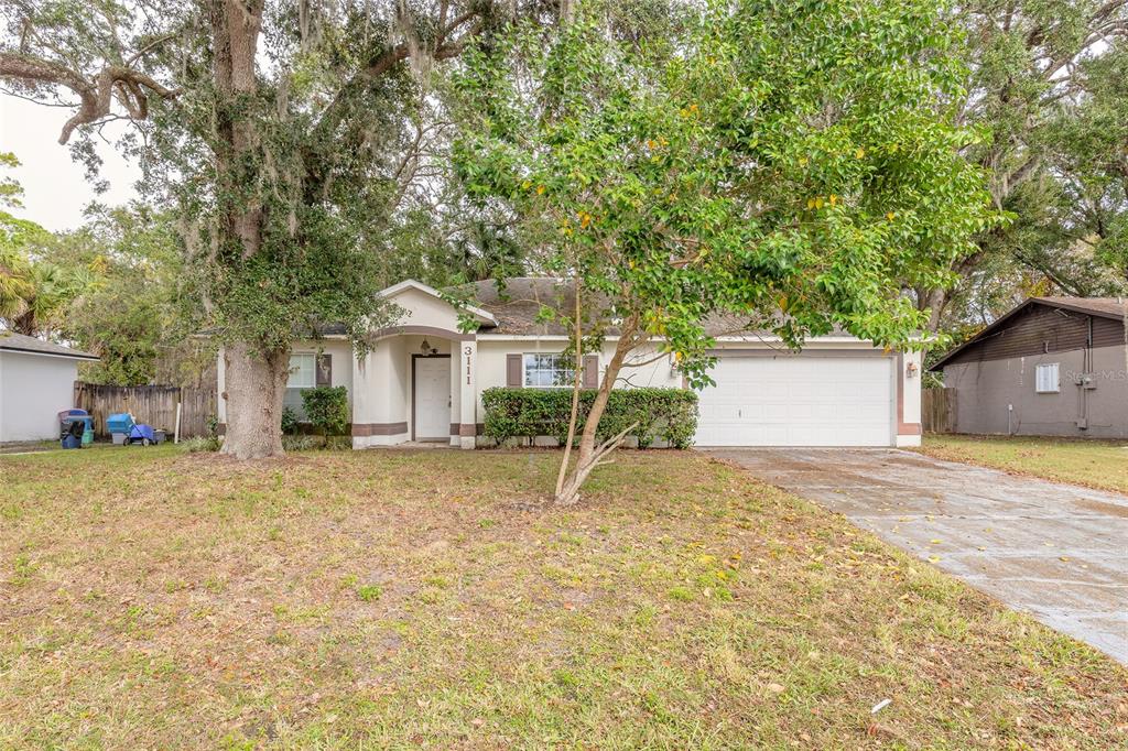 a house with trees in front of it