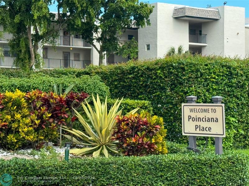 a sign on the side of the house