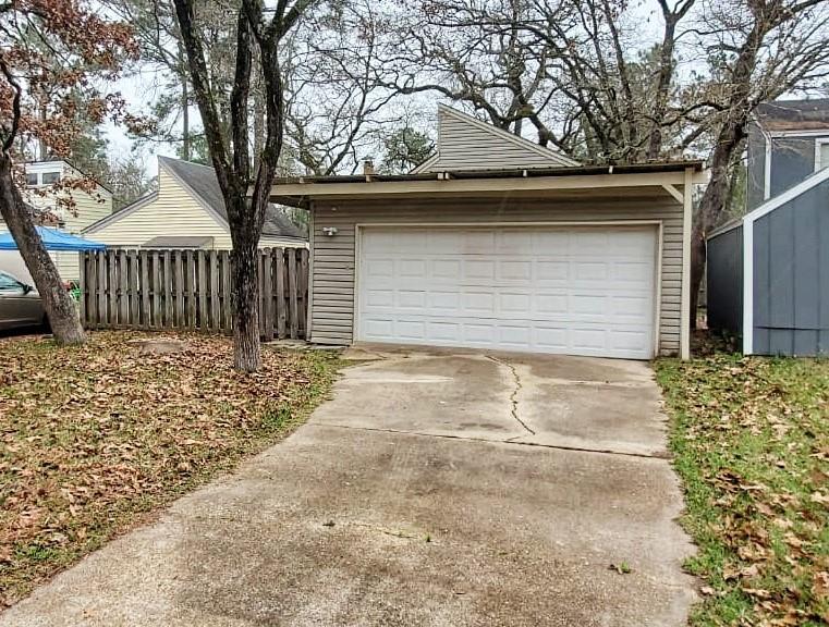 a front view of a house with a garage