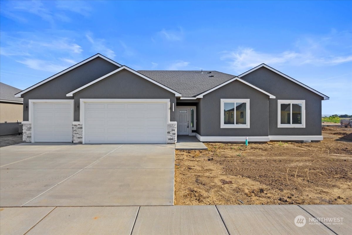 a house with yard in the background