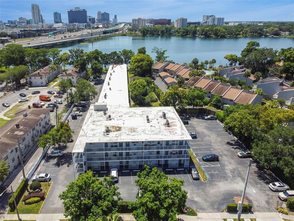 an aerial view of a house with a lake view