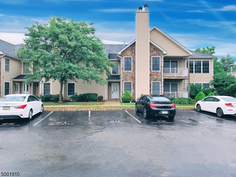 a car parked in front of a house