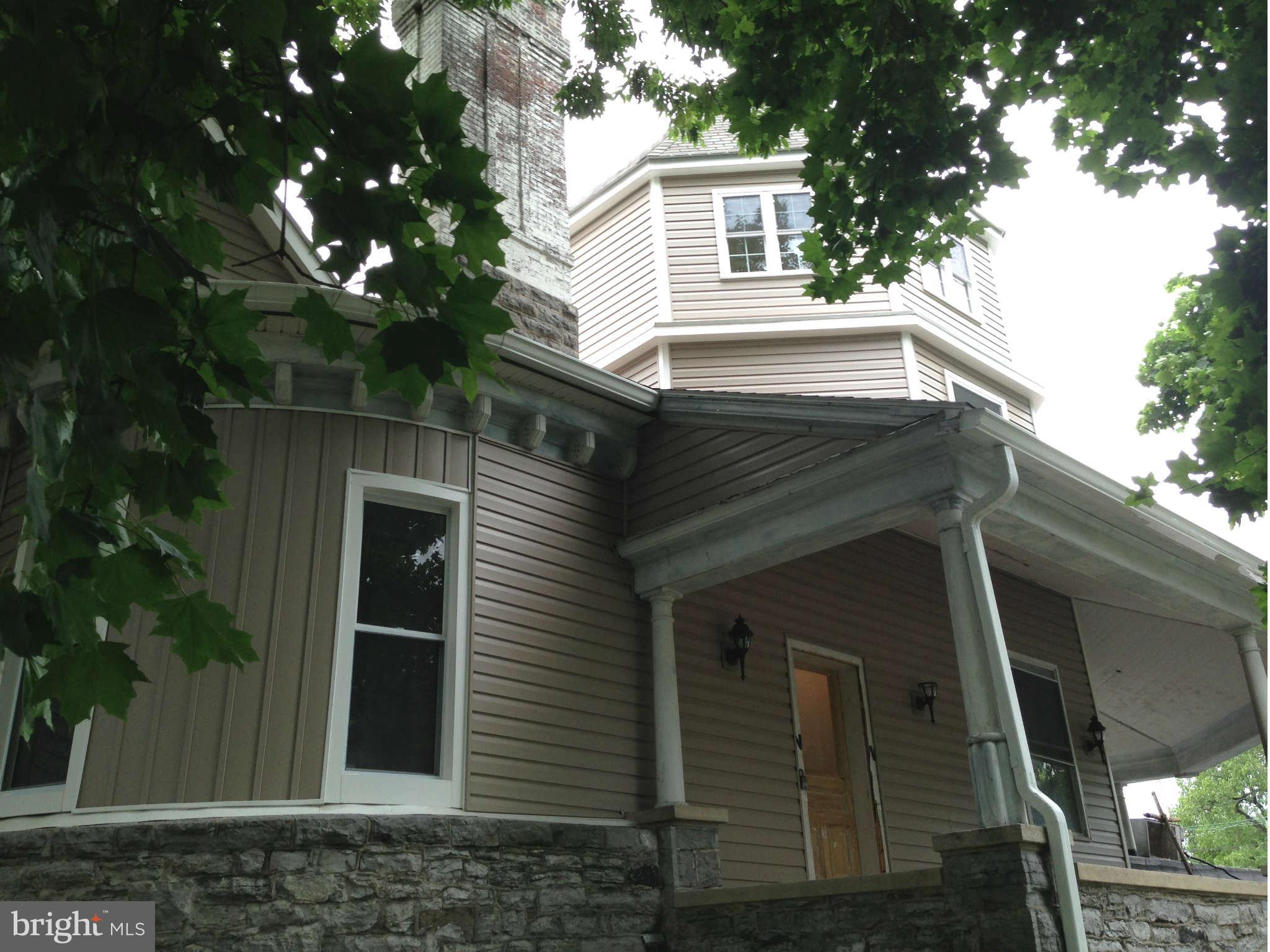 a view of house with outdoor space