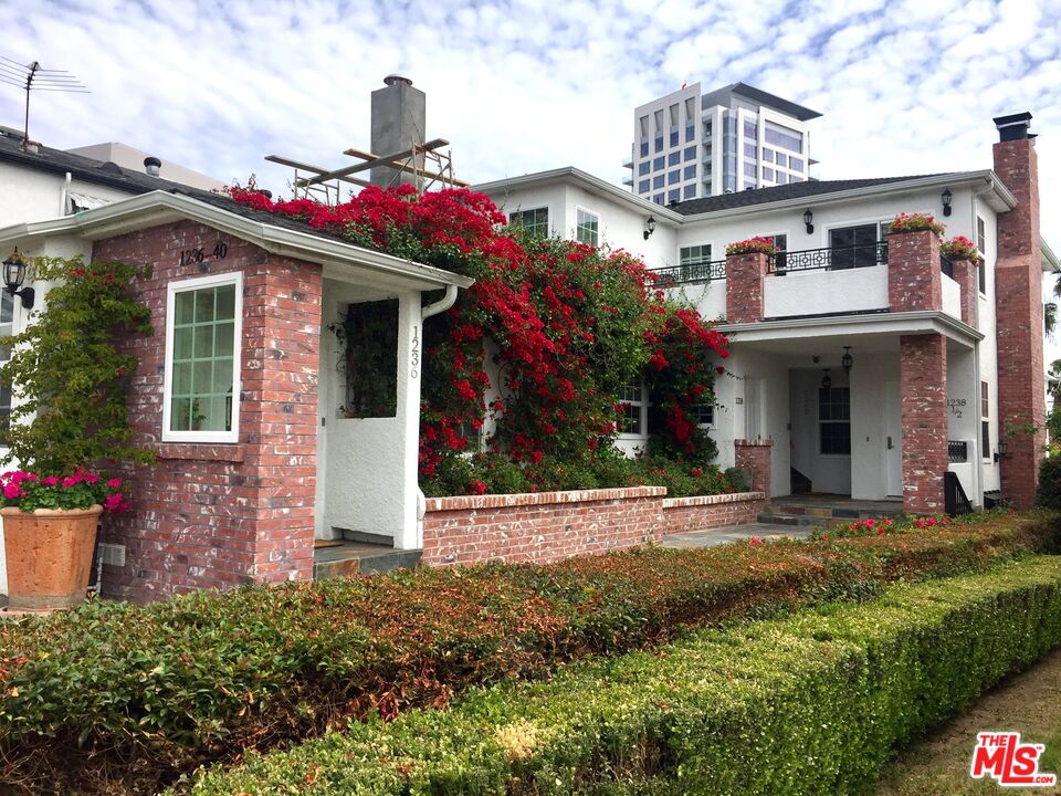 a front view of a house with a porch