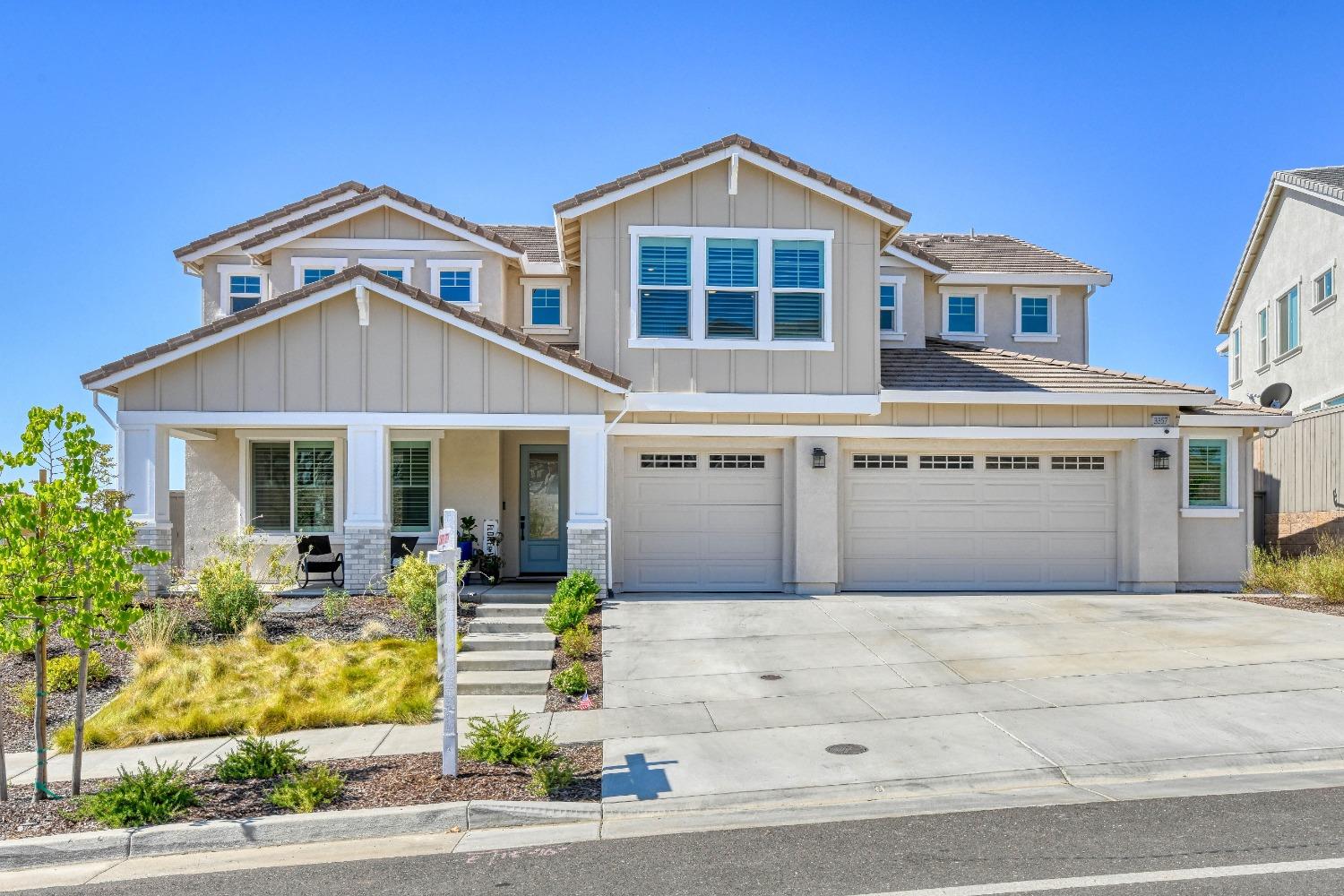 a front view of a house with entertaining space