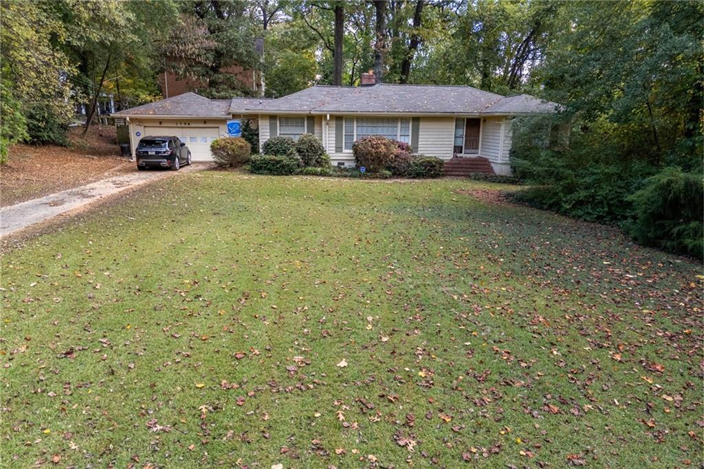 a view of a house with a garden