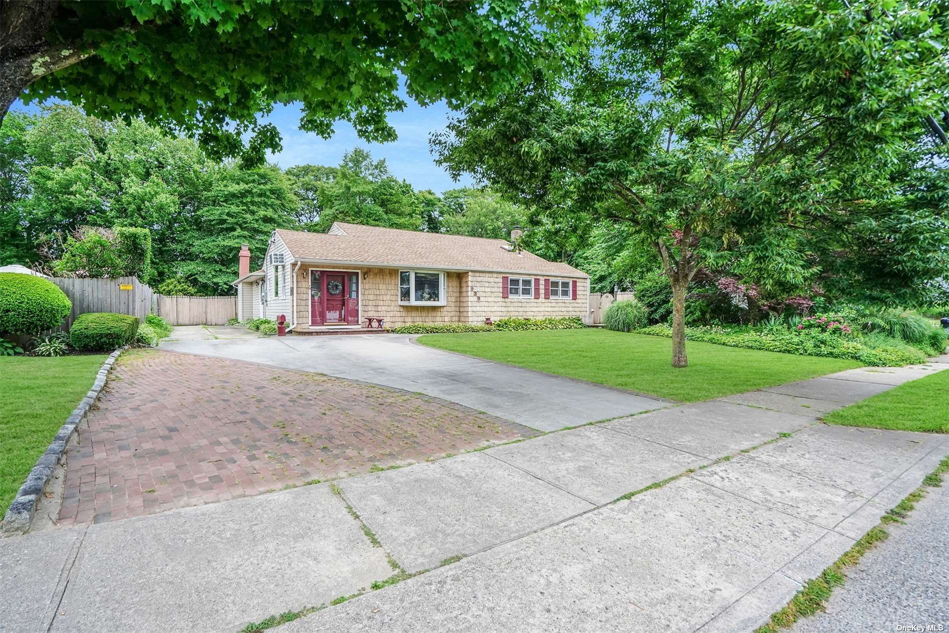 a view of house with outdoor space and street view