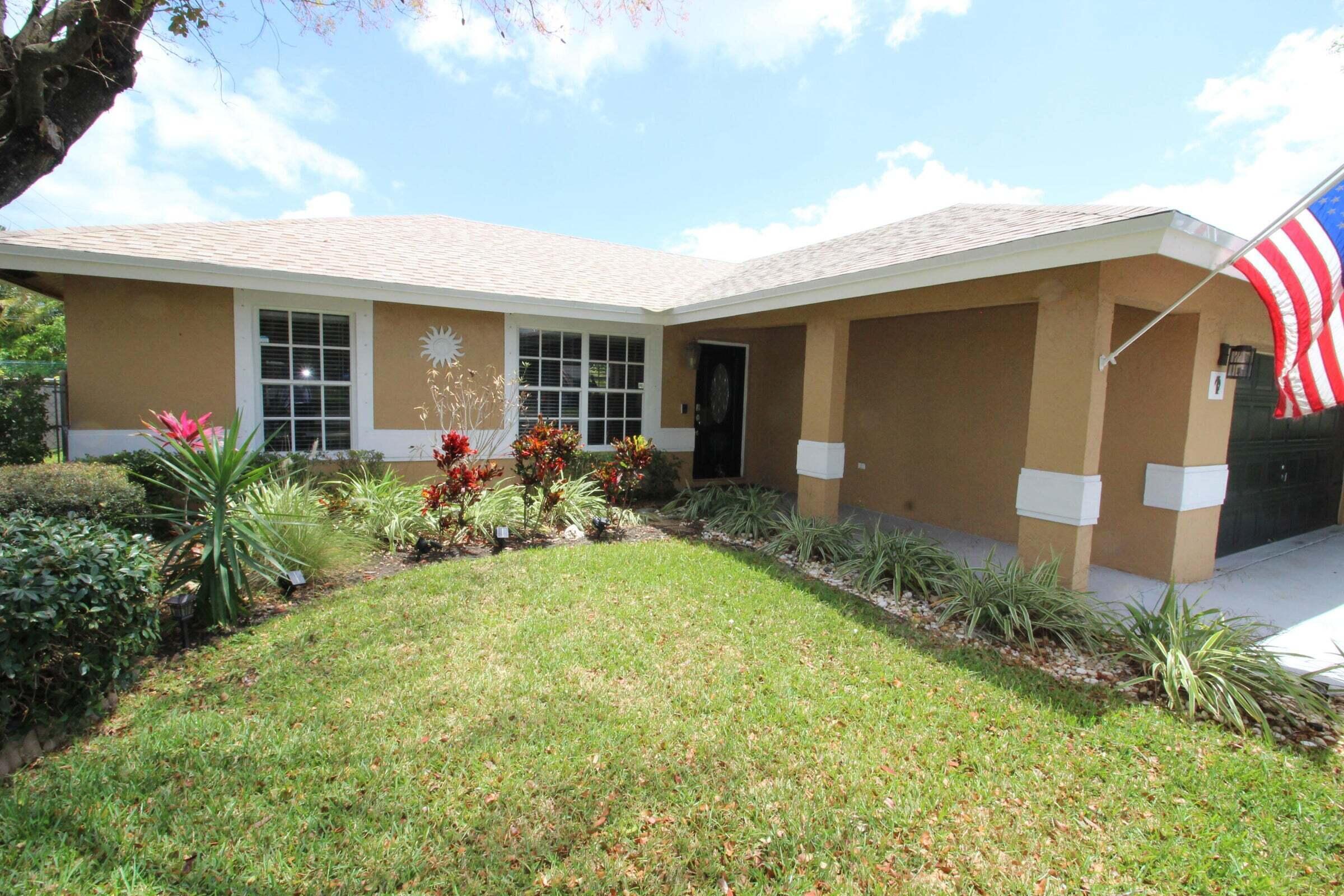 a front view of house with yard